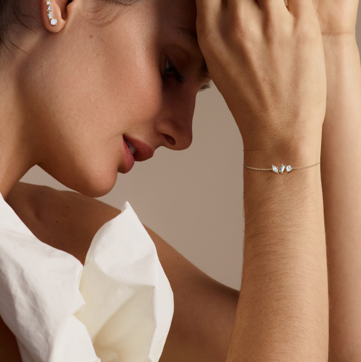 Women wearing VRAI created diamond Orion bracelet