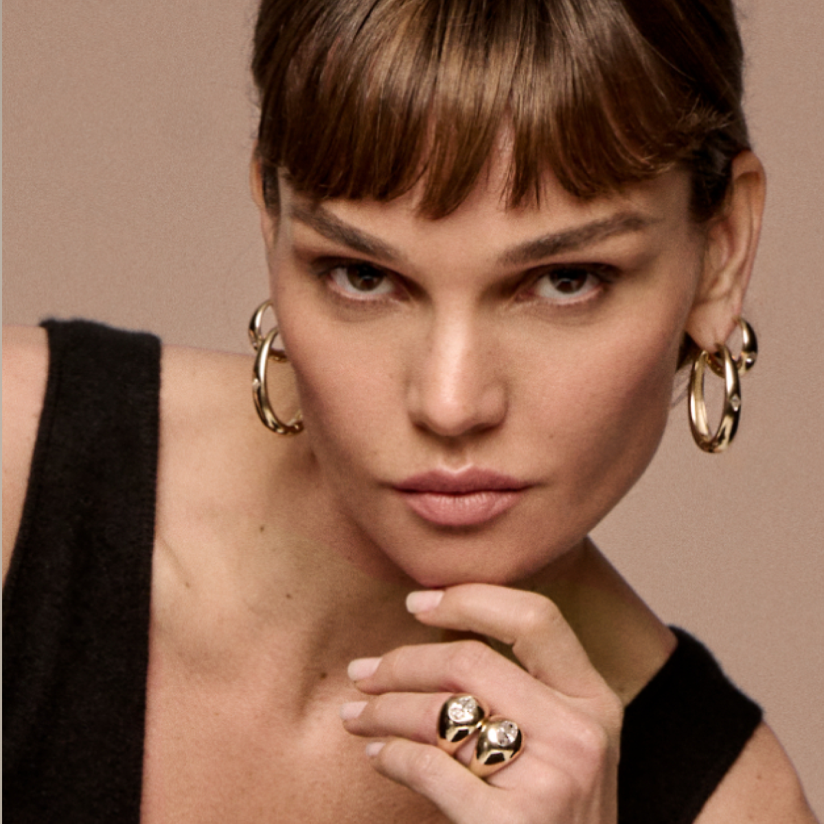 Women wearing VRIA created diamond hoop earrings designed by Petra & Meehan Flannery