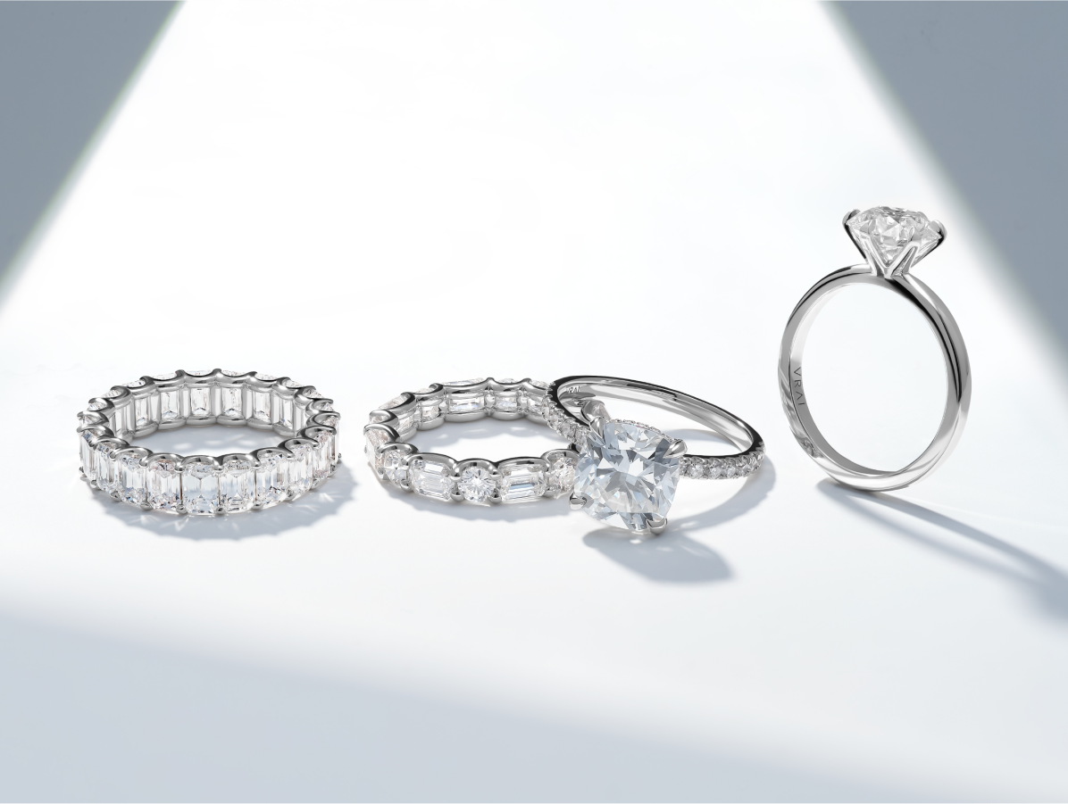 Image of engagement rings and wedding bands featuring VRAI created diamonds