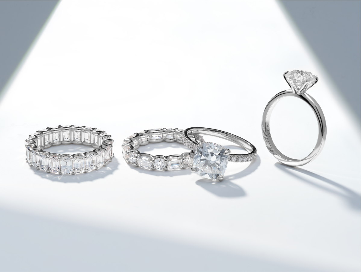 Image of engagement rings and wedding bands featuring VRAI created diamond
